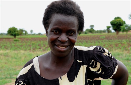Farmer Grace Halmiton Of The Kafulu Farmer 's Association Intends To Fund Her Livestock Business With The Funds From Her Receipt